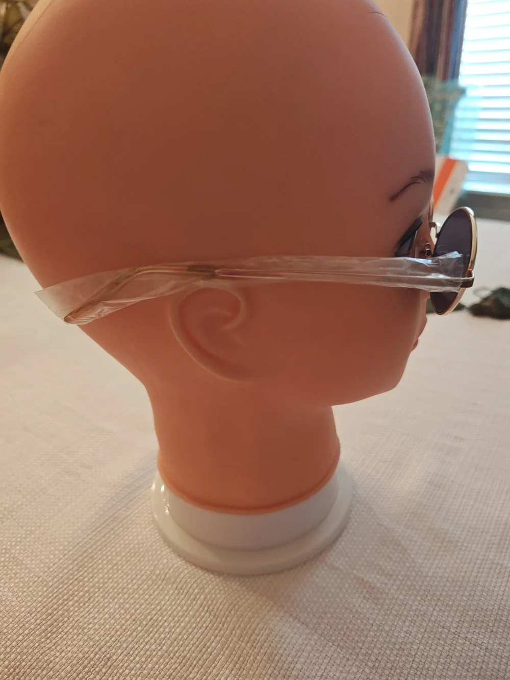 FRYE AND CO. Gold Frame Sunglasses with Dark Lenses